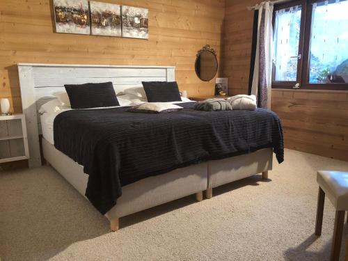 Cama o camas de una habitación en Appartement supérieur Winoka Lodge