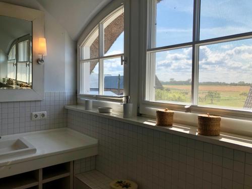 Koupelna v ubytování Landhaus am Achterwasser mit Bootssteg
