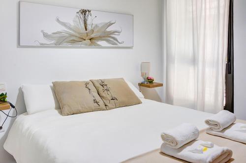 A bed or beds in a room at Apartamento San Julian