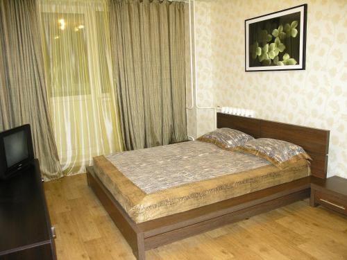 Posteľ alebo postele v izbe v ubytovaní Apartments on Otradnaya and Kho Shi Mina