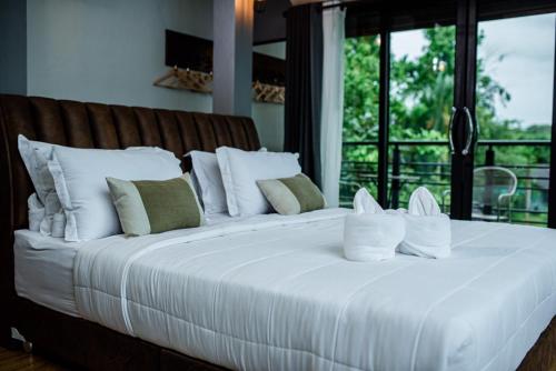 Letto o letti in una camera di Canvas Family Home