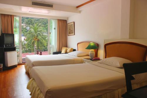 Imagen de la galería de Orchid Hotel and Spa Kalim Bay, en Patong Beach