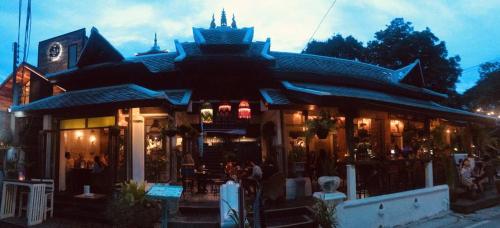 a store front of a building at night at Soi One Boutique Bedrooms in Pai