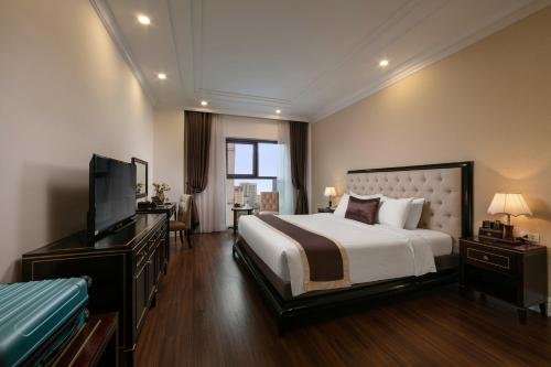 Katil atau katil-katil dalam bilik di Adonis Hotel