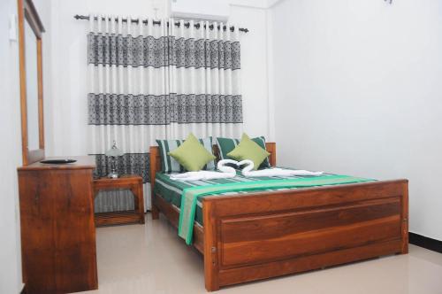 Postel nebo postele na pokoji v ubytování Restwell Homestay