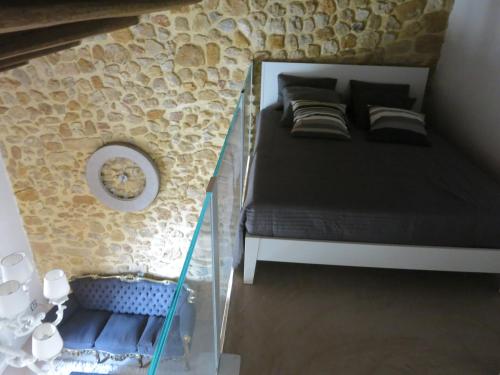 Postel nebo postele na pokoji v ubytování Atelier di Birbiciú