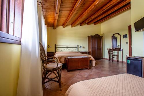Postel nebo postele na pokoji v ubytování La Vignazza B&B