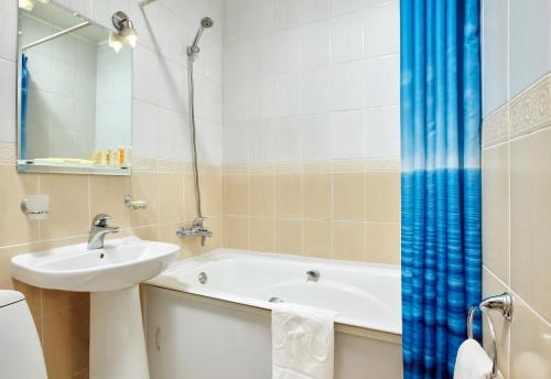 Ванна кімната в Hotel Impuls