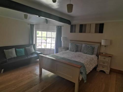 Ένα ή περισσότερα κρεβάτια σε δωμάτιο στο The Mill Bed and Breakfast