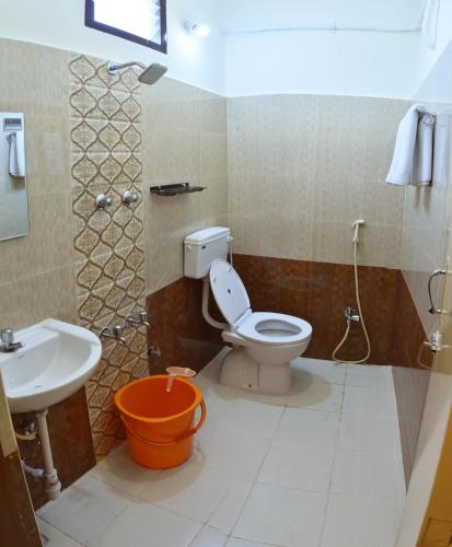 Koupelna v ubytování Siva Residency