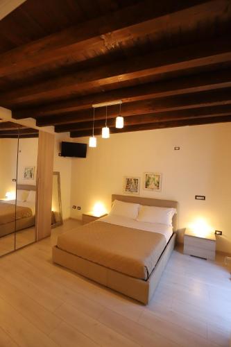 Katil atau katil-katil dalam bilik di Italiana Resort Atrio