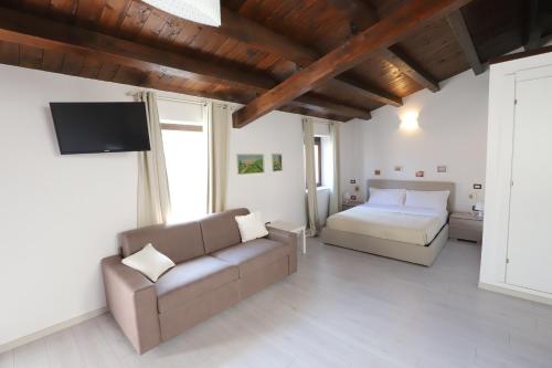 Katil atau katil-katil dalam bilik di Italiana Resort Atrio