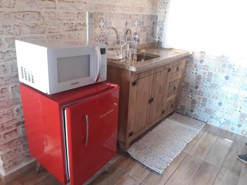 Nhà bếp/bếp nhỏ tại Chalé Safira