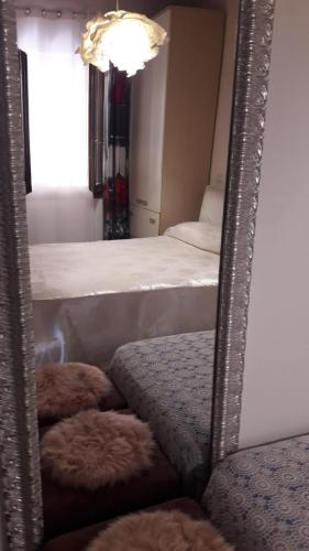 a mirror in a room with two bunk beds at Villa Masullo in Mercogliano