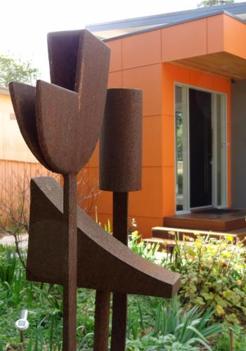 a sculpture of two lamps in front of a building at The Gallery Accommodation McCrae in McCrae