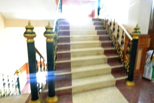 a stairway with a blue beam of light coming down it at Rose Garden Hotel in Phra Nakhon Si Ayutthaya