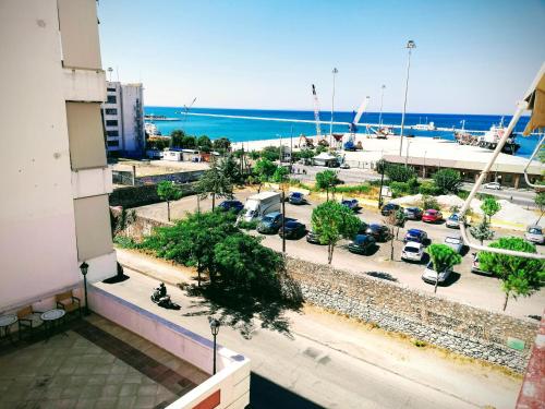 a view of a parking lot from a building at Central in Patra