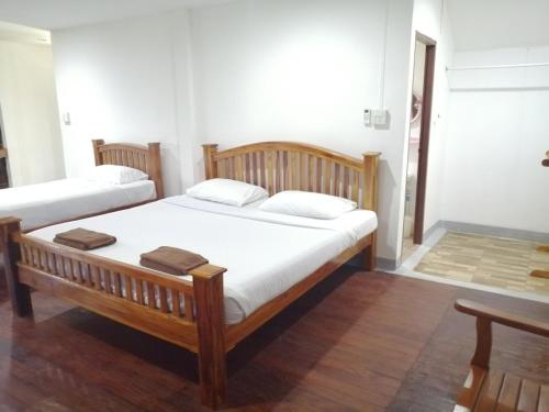 Postel nebo postele na pokoji v ubytování Jansom Beach Resort