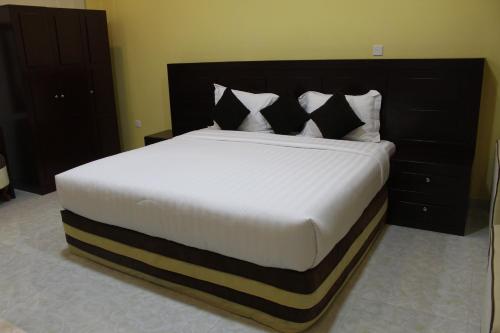 Postel nebo postele na pokoji v ubytování Alsafa Hotel