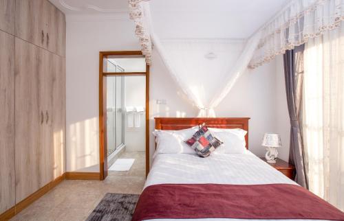 Cama o camas de una habitación en Caran Apartments