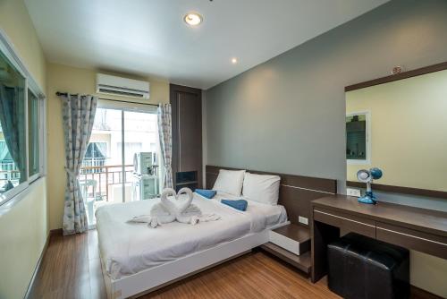 Vuode tai vuoteita majoituspaikassa Apartment at Phuket Villa Condo by Lofty