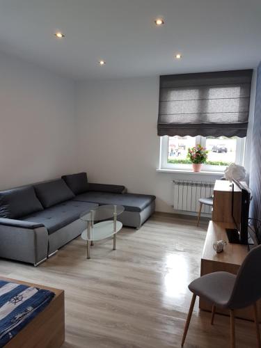 Posezení v ubytování Apartament przy plaży