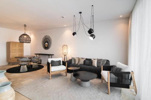 Coin salon dans l'établissement Villa Chinka by Astor Garden Hotel - Adults Only