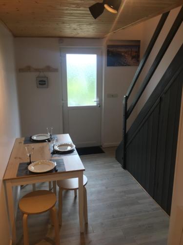 Photo de la galerie de l'établissement La petite maison du jardin, à Magny-en-Bessin