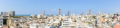 an aerial view of a city with tall buildings at The Rambam Residence - By Localz Group in Tel Aviv