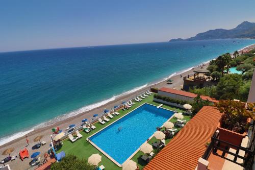 an aerial view of a beach with a swimming pool at Park Hotel Silemi in Letojanni