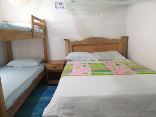 Voodi või voodid majutusasutuse Hostel Blue Sea Rincon del Mar toas