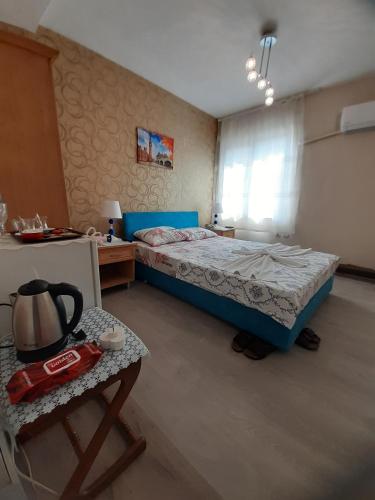Postel nebo postele na pokoji v ubytování SAYDAM OTEL