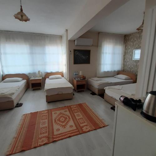 Postel nebo postele na pokoji v ubytování SAYDAM OTEL
