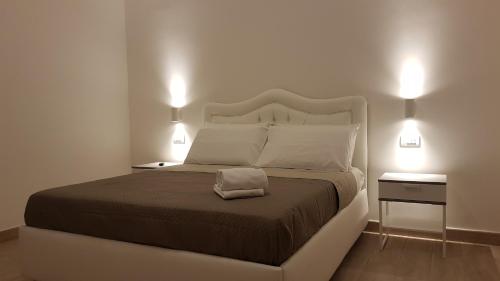 Postel nebo postele na pokoji v ubytování B&B Pompeii Rooms