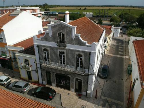 an aerial view of a building in a city at Casa da Rainha in Azambuja