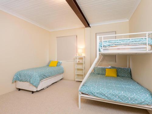 Ένα ή περισσότερα κρεβάτια σε δωμάτιο στο Werri Views