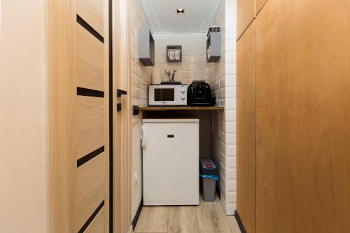 Virtuvė arba virtuvėlė apgyvendinimo įstaigoje Mini Hotel Buzzok