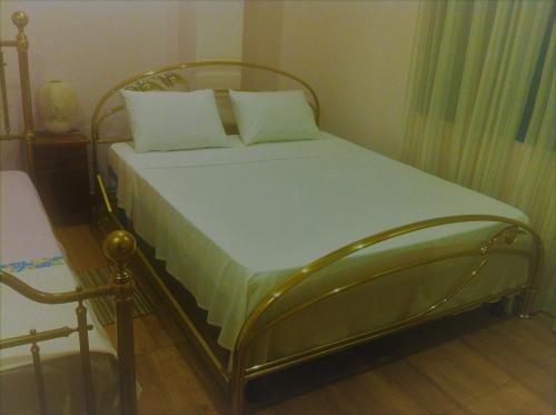 Cama o camas de una habitación en Himagira Hotel