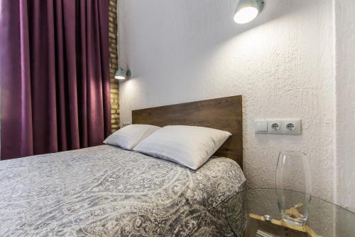 Ліжко або ліжка в номері Kyiv Cozy Loft