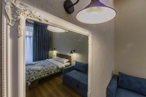 Ένα ή περισσότερα κρεβάτια σε δωμάτιο στο Kyiv Family Loft
