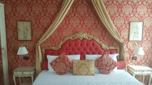 Ένα ή περισσότερα κρεβάτια σε δωμάτιο στο Friendly Venice Suites