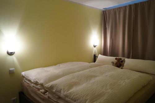 Postelja oz. postelje v sobi nastanitve FeWo La Lavendula