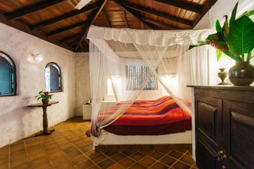 Krevet ili kreveti u jedinici u objektu Secret Garden Villa - Unawatuna