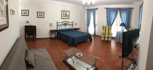 Postel nebo postele na pokoji v ubytování Hotel La Yedra