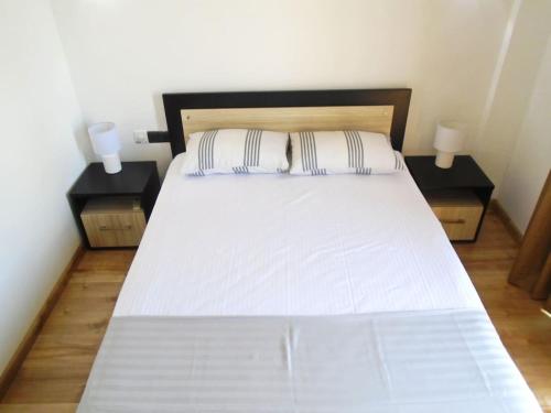Posteľ alebo postele v izbe v ubytovaní Palmyrah Court Apartment 2BR