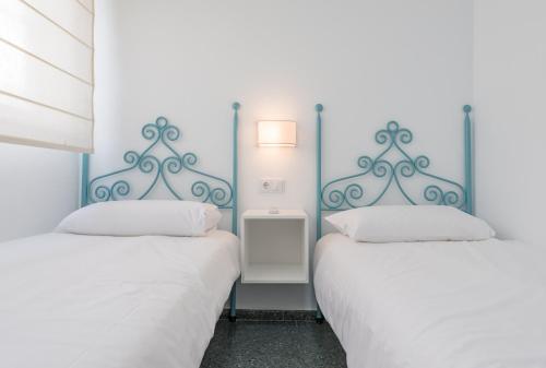 Cama o camas de una habitación en Sherryflat Casa del Arquitecto