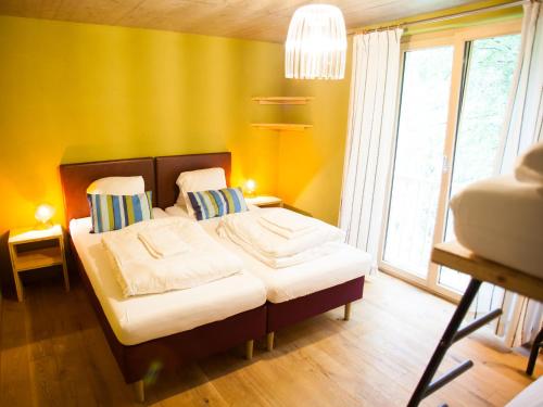 Postel nebo postele na pokoji v ubytování Nangijala Guest House