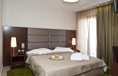 Posteľ alebo postele v izbe v ubytovaní Hotel Konaki