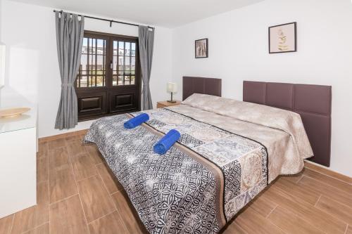 Postel nebo postele na pokoji v ubytování Apartamento GOLDEN Teguise