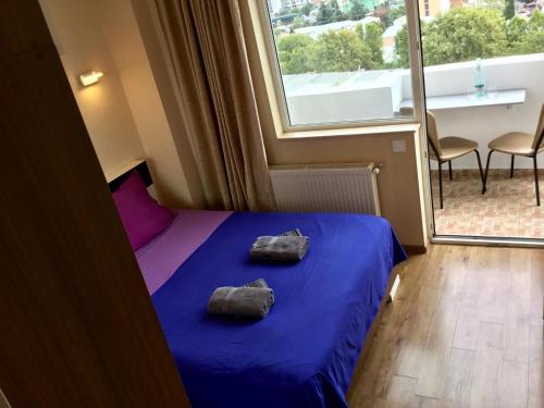 Llit o llits en una habitació de Welcome генацвале)))